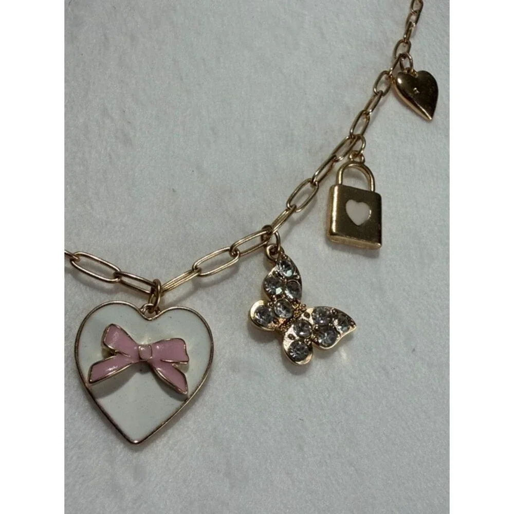 Packed Party Gold-Tone Heart & Charm Necklace with Pink Bow Accent